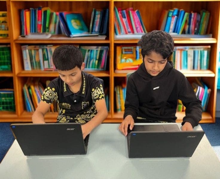 students on laptops